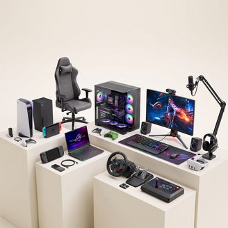 PC and gaming setup with consoles, gaming computer, monitor, accessories, chair, and microphone